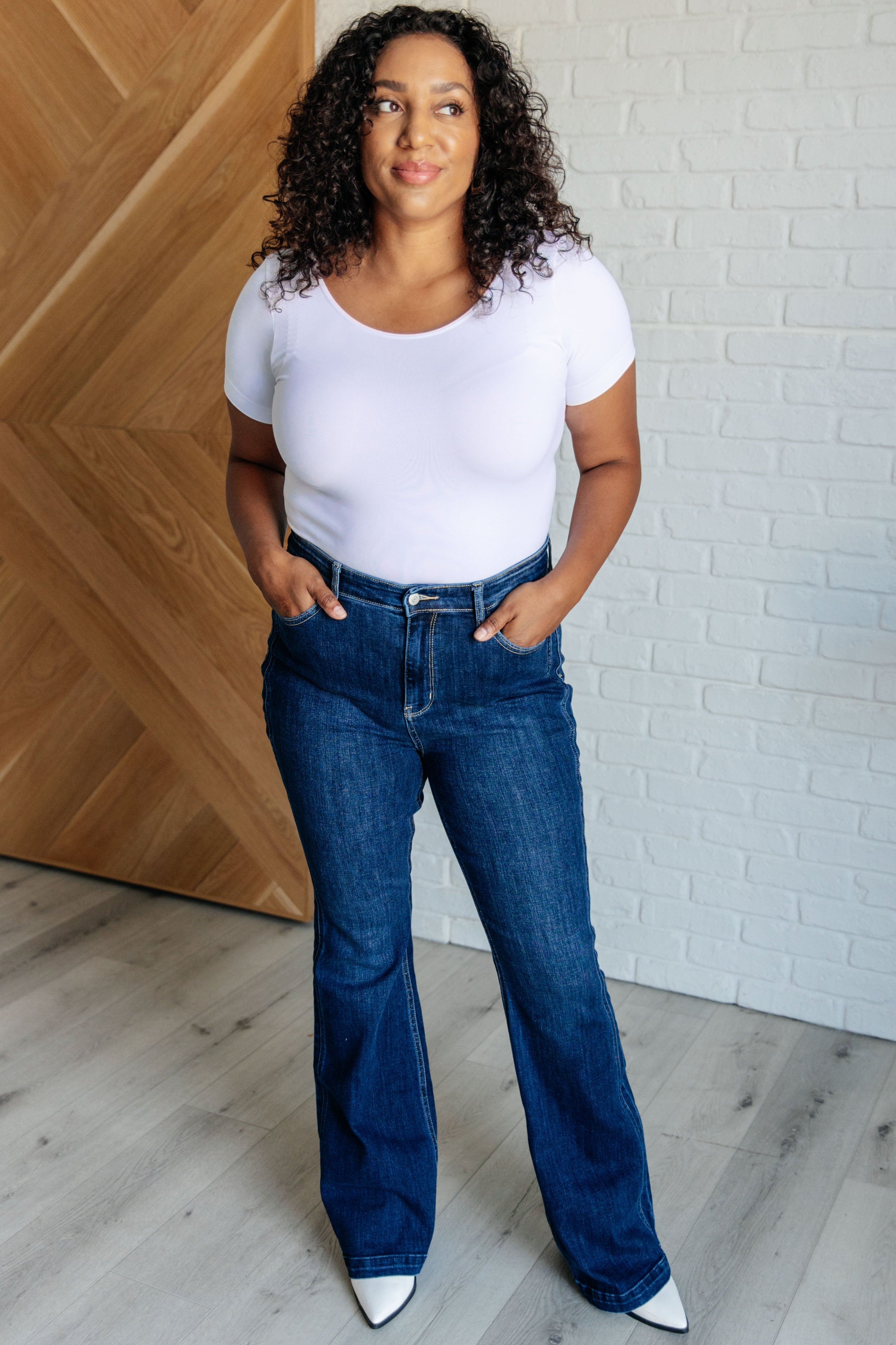 Judy Blue Mavis High Rise Side Seam Detail Flare Jeans styled with boots and white bodysuit