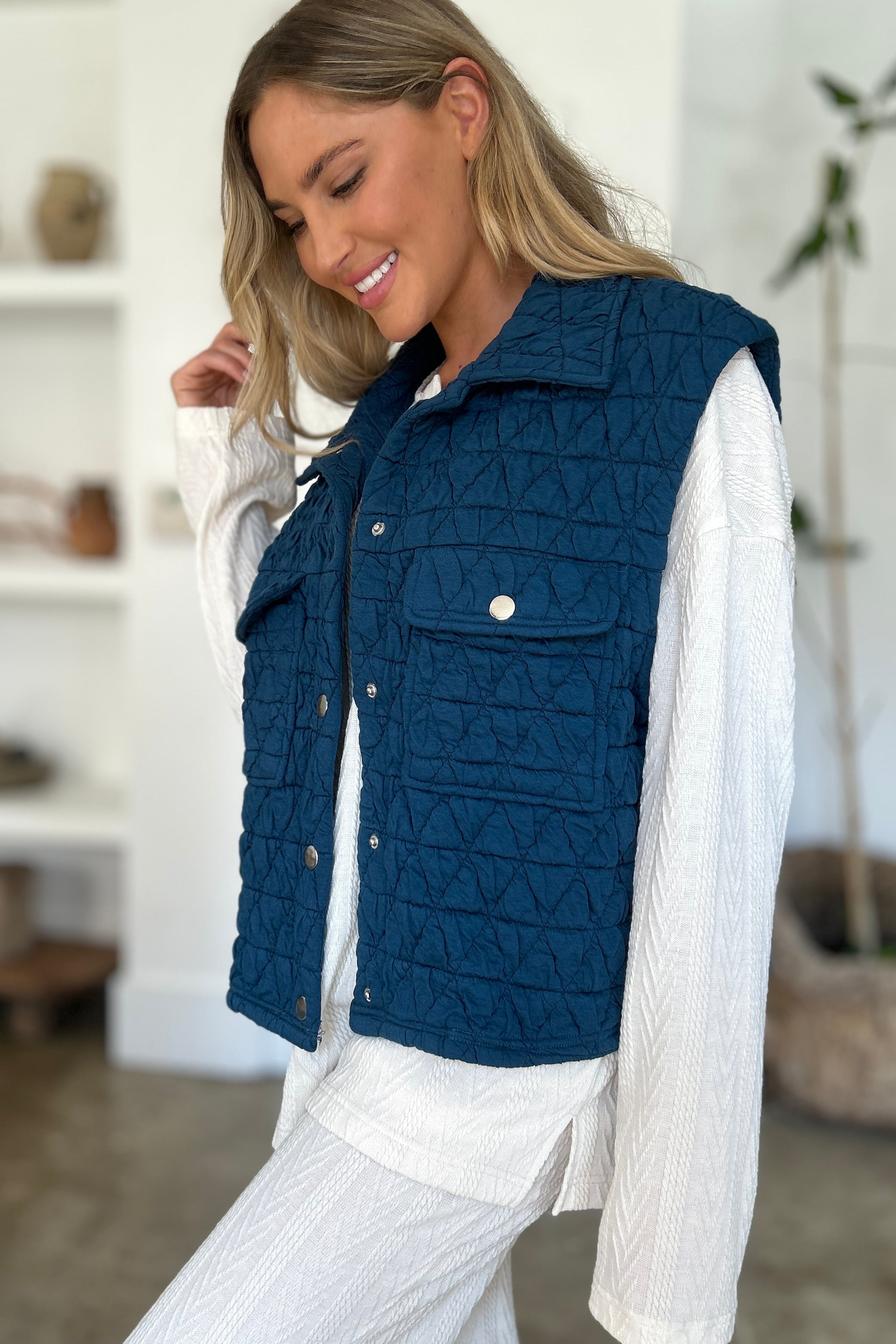 Back View of Quilted Textured Peacock Blue Vest with Button Snaps relaxed style