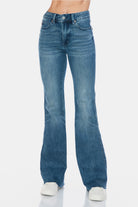 Judy Blue Mid Rise Tummy Control Cut Hem Flare Jeans in Vintage Wash with no distressing