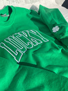 Embroidered Lucky Sweatshirt with clover on sleeve on Kelly Green Gildan Sweatshirt