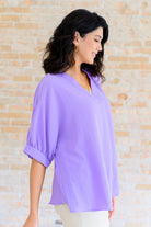 Relaxed sleeve on the Up For Anything V-Neck Blouse in Lavender by Andree by Unit 